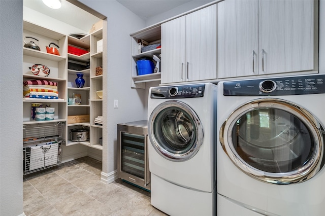2129 Harbor Pointe Dr, Frisco, TX 75036 - washroom with wine cooler, washer and dryer, cabinet space, and light tile patterned floors