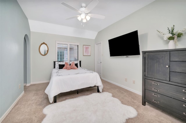4644 Pony Ct, Carrollton, TX 75010 - bedroom featuring light colored carpet, arched walkways, a ceiling fan, and lofted ceiling