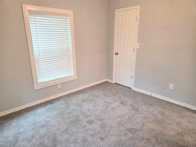 2110 W Bond St, Denison, TX 75020 - carpeted spare room featuring plenty of natural light