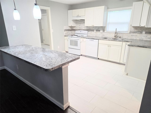 2110 W Bond St, Denison, TX 75020 - kitchen with white appliances, backsplash, white cabinets, and decorative light fixtures