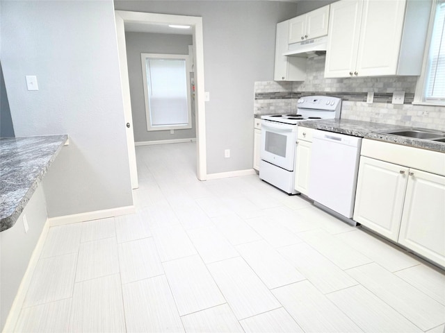 2110 W Bond St, Denison, TX 75020 - kitchen with white appliances, under cabinet range hood, backsplash, and white cabinetry