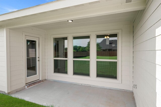 733 Stone Eagle Dr, Azle, TX 76020 - view of exterior entry with a patio area