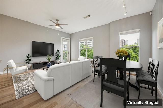 2950 Mckinney Ave Unit 419, Dallas, TX 75204 - empty room with a ceiling fan and light wood-style flooring
