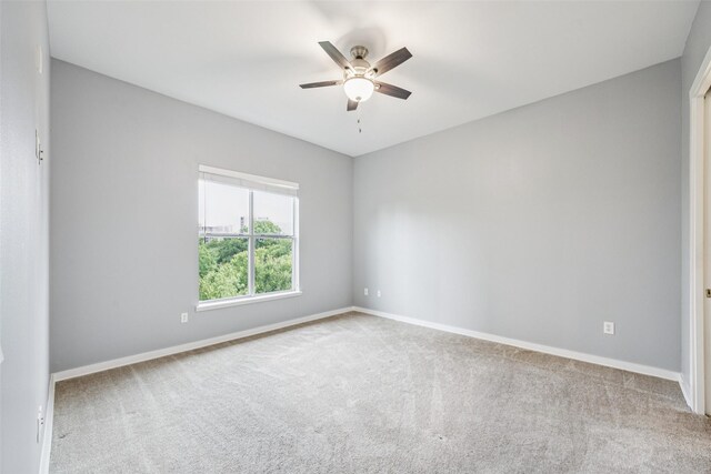 2950 Mckinney Ave Unit 419, Dallas, TX 75204 - spare room with carpet flooring and ceiling fan