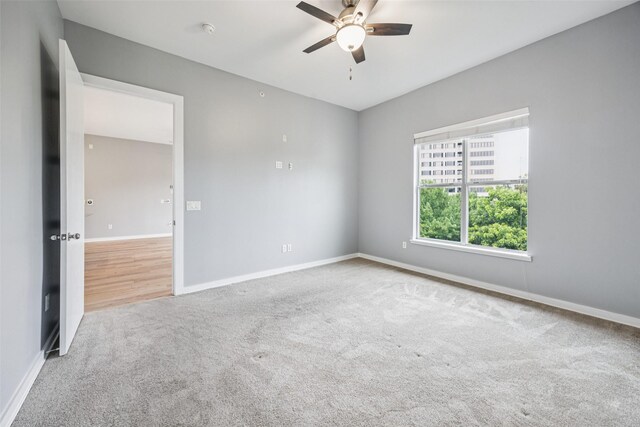 2950 Mckinney Ave Unit 419, Dallas, TX 75204 - bathroom with a shower stall, tile patterned flooring, vanity, and a spacious closet