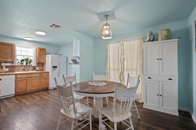 415 Lake By Dr, Kemp, TX 75143 - dining area featuring dark wood-style flooring