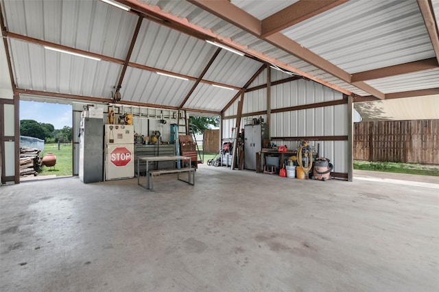 415 Lake By Dr, Kemp, TX 75143 - garage with freestanding refrigerator
