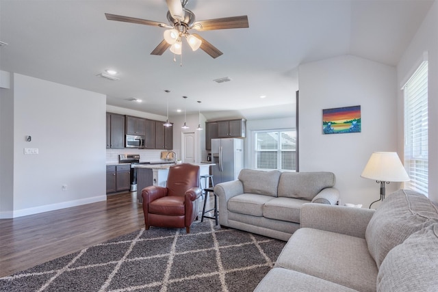 111 Arrowhead Dr, Sanger, TX 76266 - living area with dark wood finished floors, a ceiling fan, and recessed lighting