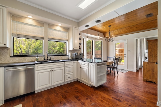 3217 Oak Tree Ln, Grapevine, TX 76051 - kitchen featuring dishwasher, dark countertops, a peninsula, a chandelier, and dark wood finished floors
