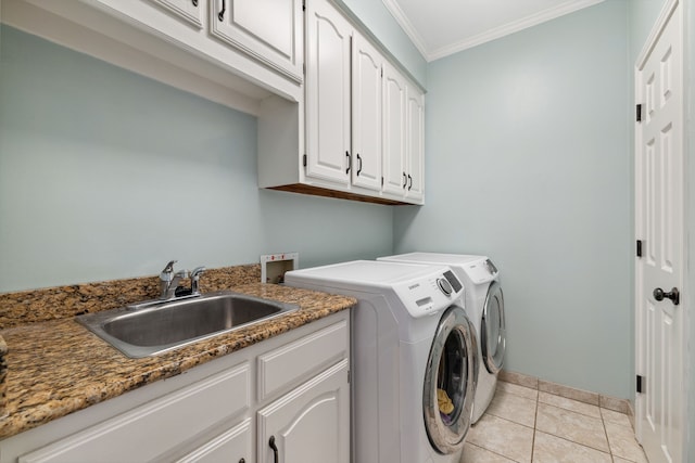 3217 Oak Tree Ln, Grapevine, TX 76051 - laundry room with washer and dryer, cabinet space, ornamental molding, and light tile patterned floors