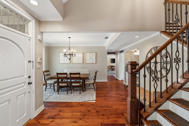3217 Oak Tree Ln, Grapevine, TX 76051 - entrance foyer featuring dark wood-type flooring, ornamental molding, stairs, a chandelier, and recessed lighting