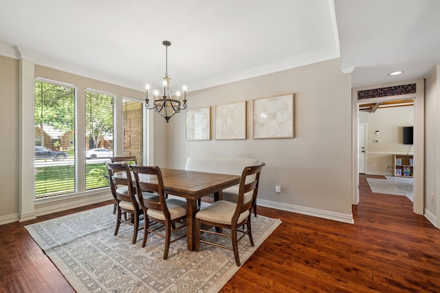 3217 Oak Tree Ln, Grapevine, TX 76051 - dining room with a chandelier, ornamental molding, and dark wood finished floors