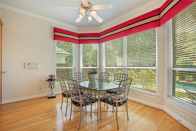 2327 Clearspring Dr N, Irving, TX 75063 - dining area with light wood finished floors, a ceiling fan, and crown molding