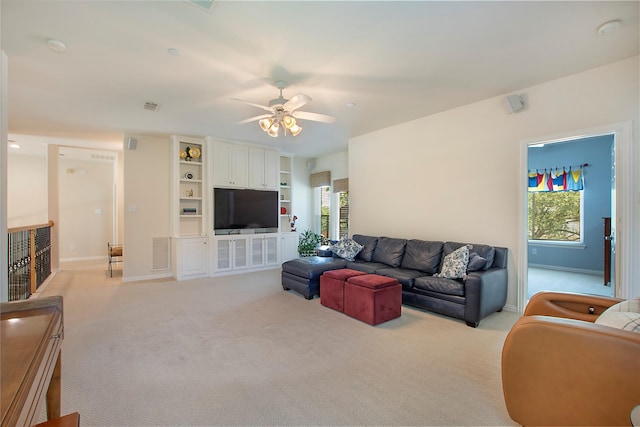 2327 Clearspring Dr N, Irving, TX 75063 - living room with ceiling fan and light colored carpet