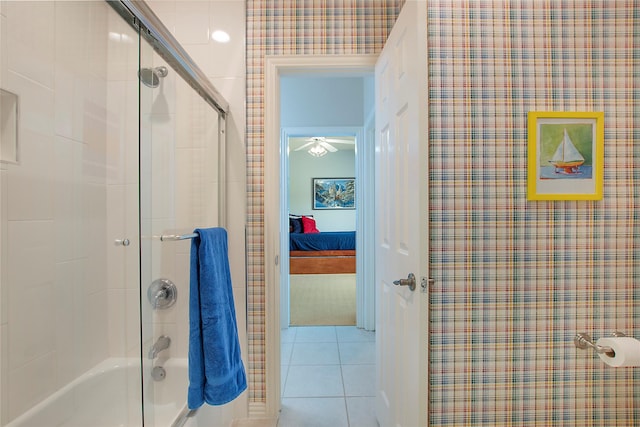 2327 Clearspring Dr N, Irving, TX 75063 - ensuite bathroom featuring tile patterned flooring, a ceiling fan, and shower / bath combination with glass door