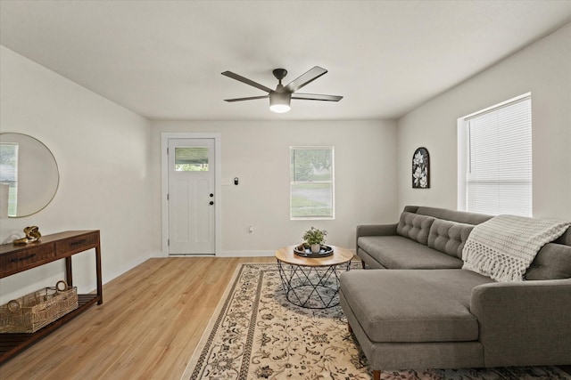 709 E Gandy St, Denison, TX 75021 - living area featuring a ceiling fan and light wood finished floors