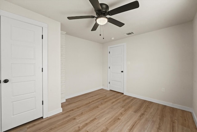 709 E Gandy St, Denison, TX 75021 - unfurnished bedroom with light wood-style flooring and ceiling fan