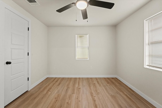 709 E Gandy St, Denison, TX 75021 - spare room featuring light wood-type flooring and a ceiling fan
