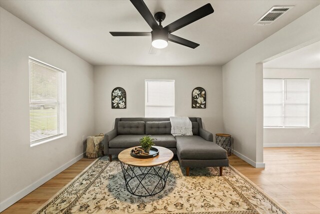 709 E Gandy St, Denison, TX 75021 - living room with a ceiling fan and light wood finished floors