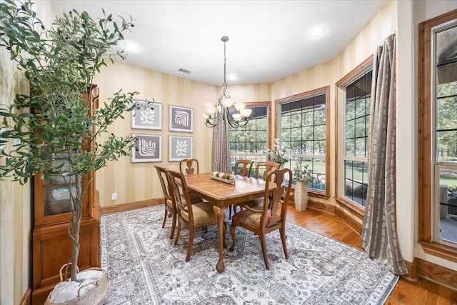 2702 Hidden Trails Rd, Royse City, TX 75189 - dining room featuring a chandelier, wood finished floors, wallpapered walls, and recessed lighting