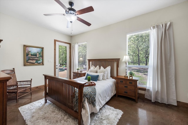 2702 Hidden Trails Rd, Royse City, TX 75189 - bedroom with access to outside, multiple windows, concrete flooring, and ceiling fan
