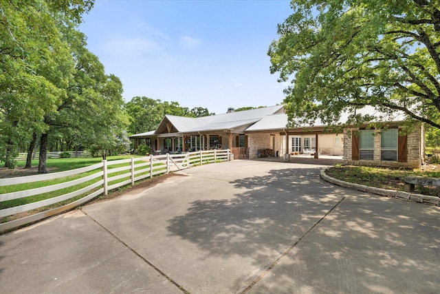 2702 Hidden Trails Rd, Royse City, TX 75189 - view of front of property with concrete driveway and a metal roof