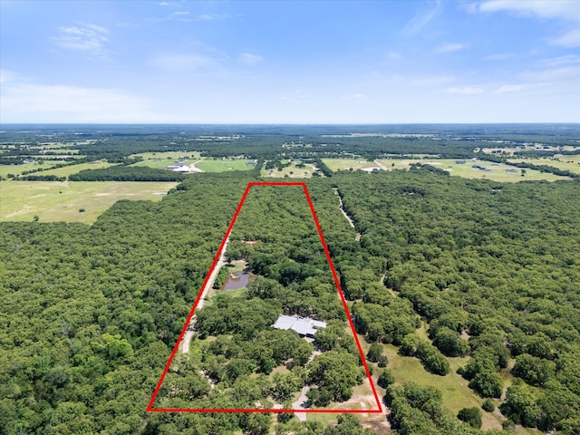 2702 Hidden Trails Rd, Royse City, TX 75189 - aerial view of property and surrounding area featuring property parcel outlined and a heavily wooded area