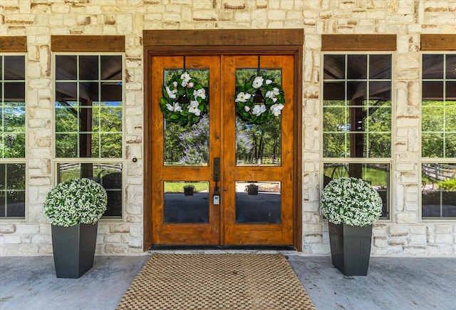 2702 Hidden Trails Rd, Royse City, TX 75189 - doorway to property featuring stone siding and french doors