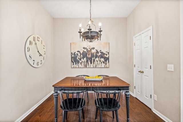 8601 Prescott Cir, Frisco, TX 75034 - dining room featuring a chandelier and dark wood-style floors