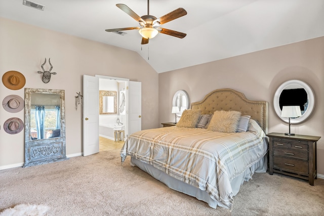 8601 Prescott Cir, Frisco, TX 75034 - bedroom with vaulted ceiling, light carpet, multiple windows, ensuite bath, and ceiling fan