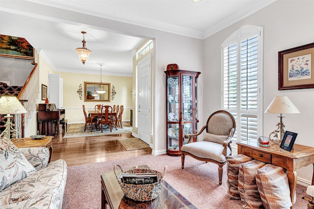 4404 Barnsley Dr, Plano, TX 75093 - living room featuring ornamental molding and wood finished floors