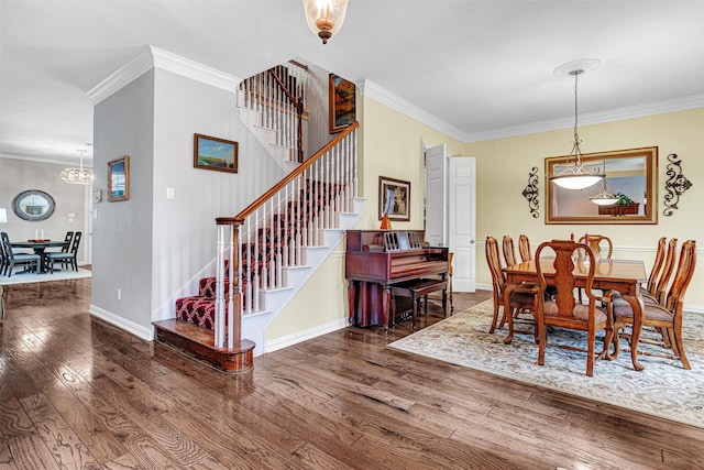 4404 Barnsley Dr, Plano, TX 75093 - dining space with stairway, hardwood / wood-style floors, crown molding, and a chandelier