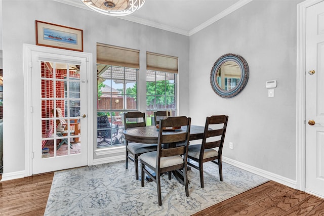 4404 Barnsley Dr, Plano, TX 75093 - dining space with wood finished floors and crown molding
