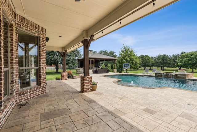 1910 Blue Forest Dr, Prosper, TX 75078 - view of swimming pool with a gazebo, a patio, and a pool with connected hot tub