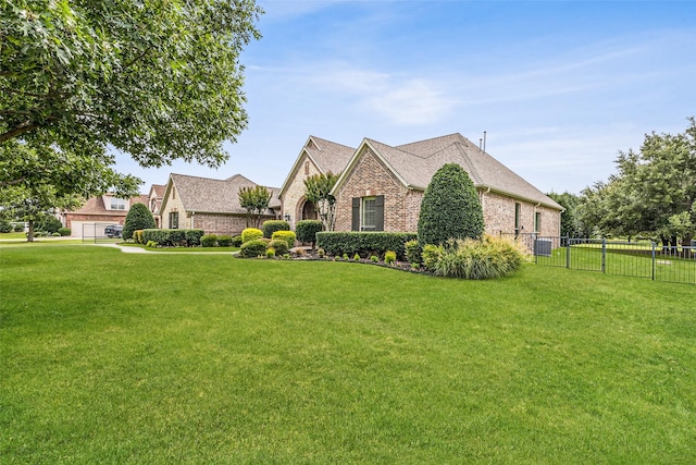 1910 Blue Forest Dr, Prosper, TX 75078 - french country style house featuring brick siding