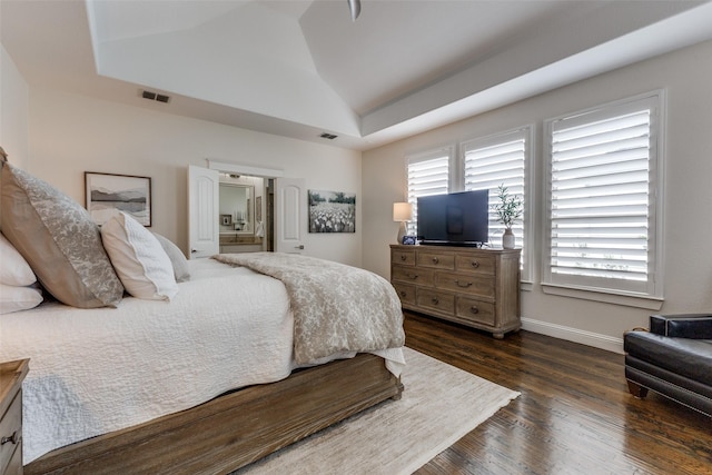7204 Ripley St, Mckinney, TX 75071 - bedroom with vaulted ceiling, dark wood-type flooring, and ensuite bath