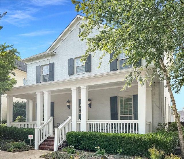 7204 Ripley St, Mckinney, TX 75071 - view of front of house featuring a porch and brick siding