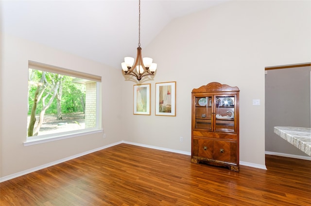 4720 Ashley Cir, Midlothian, TX 76065 - unfurnished room featuring a chandelier, wood finished floors, and high vaulted ceiling