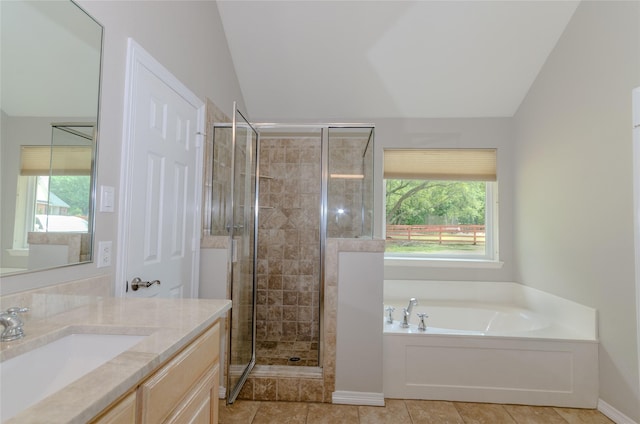 4720 Ashley Cir, Midlothian, TX 76065 - bathroom featuring vaulted ceiling, vanity, a shower stall, a bath, and plenty of natural light
