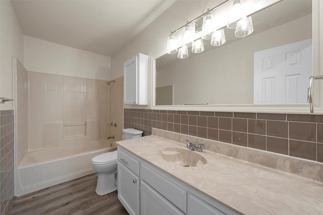 402 2nd St, Moody, TX 76557 - bathroom featuring wood finished floors, vanity, shower / tub combination, and tasteful backsplash