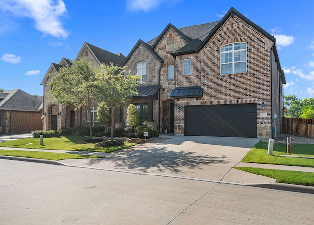 1844 Halifax St, Roanoke, TX 76262 - view of front of house with brick siding, a garage, and driveway
