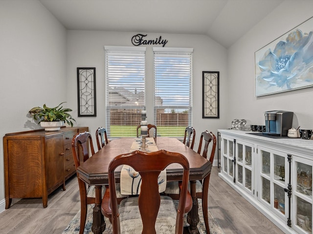 5622 Log Cabin Ct, Midlothian, TX 76065 - dining area with light wood-type flooring and lofted ceiling