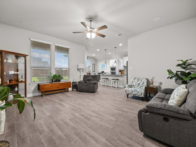 5622 Log Cabin Ct, Midlothian, TX 76065 - living room with ceiling fan and light wood-type flooring