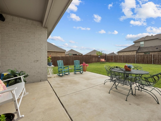 5622 Log Cabin Ct, Midlothian, TX 76065 - fenced backyard with outdoor dining space and a patio area