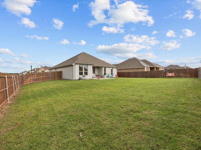 5622 Log Cabin Ct, Midlothian, TX 76065 - rear view of property featuring a fenced backyard, a patio, and stucco siding