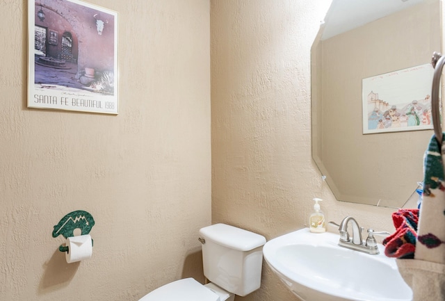1023 Muirfield Dr, Mansfield, TX 76063 - bathroom with toilet and a sink