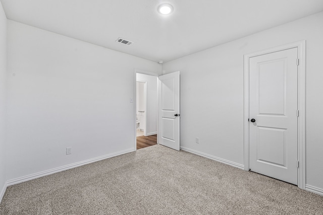 113 Aslan Rd, Poolville, TX 76487 - unfurnished bedroom featuring carpet and baseboards