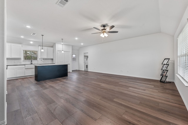 113 Aslan Rd, Poolville, TX 76487 - unfurnished living room featuring a ceiling fan, dark wood-style floors, recessed lighting, and vaulted ceiling