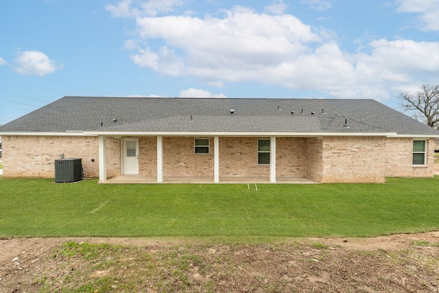 113 Aslan Rd, Poolville, TX 76487 - rear view of house with a patio, a yard, roof with shingles, and brick siding