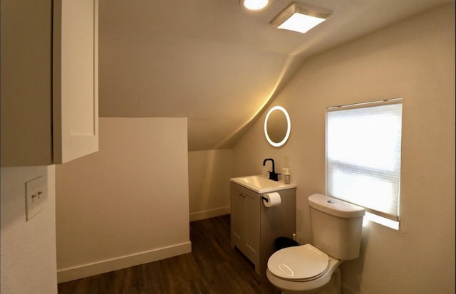 3612 Mt Vernon Ave, Fort Worth, TX 76103 - bathroom with vaulted ceiling, vanity, and wood finished floors